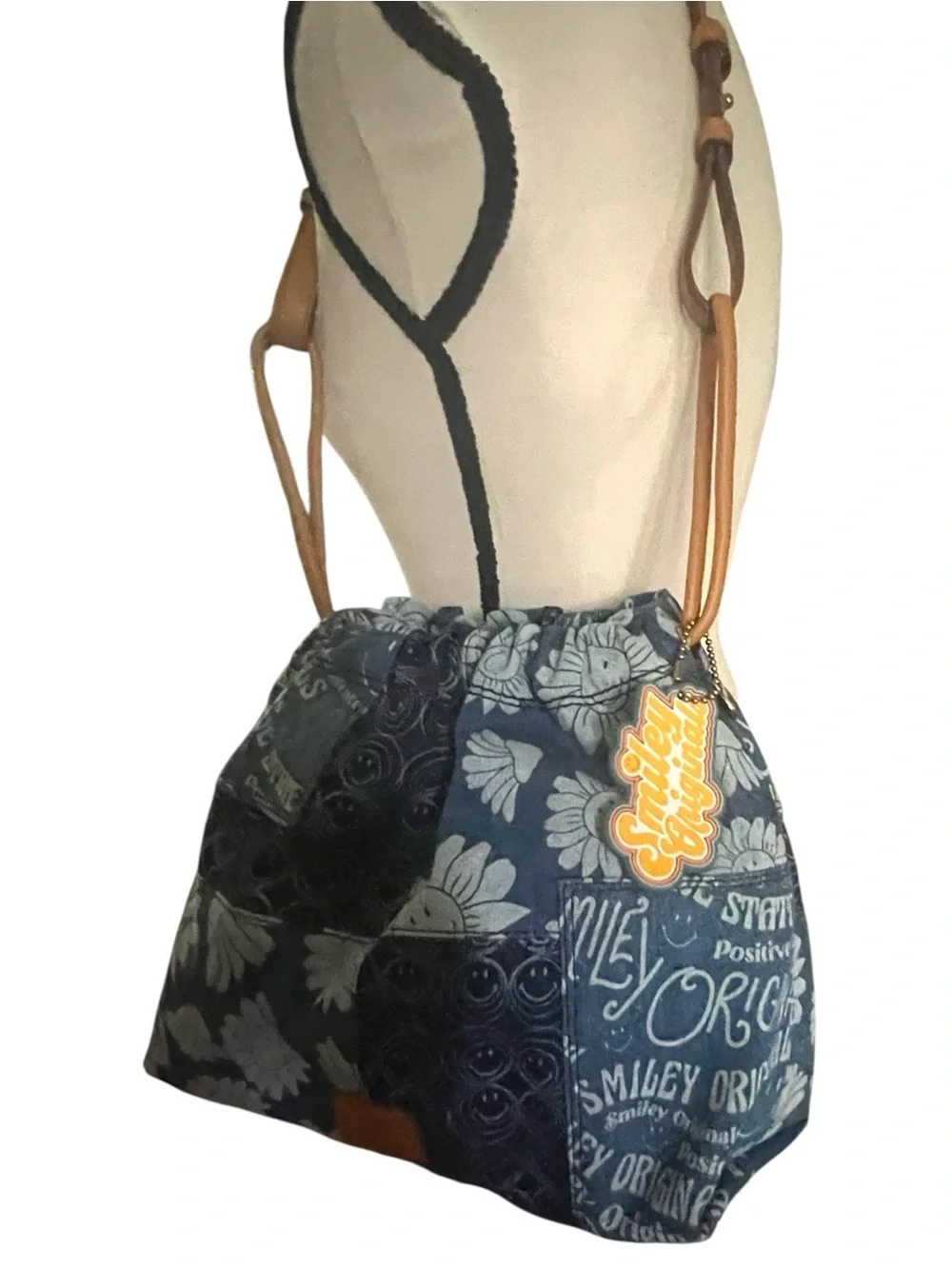 Fossil x Smiley limited edition patchwork denim drawstring shoulder bag.